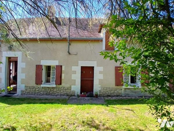 Maison à restaurer avec jardin et garage