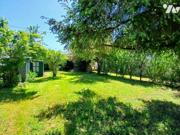 Maison à restaurer avec jardin et garage