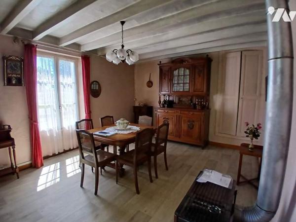 Maison à restaurer avec jardin et garage