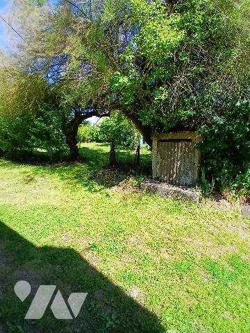 Maison à restaurer avec jardin et garage