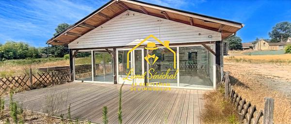 Local commercial climatisé de 130 m2 avec 2 terrasses extérieures sur une parcelle de 2 000 m2