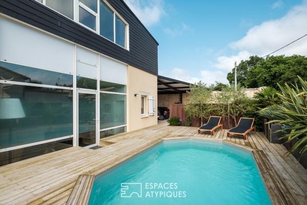 Maison contemporaine avec espace bien-être, patio et piscine à Buxerolles