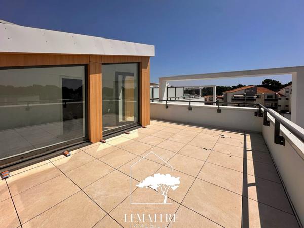 Appartement neuf toit terrasse sur la Palmyre