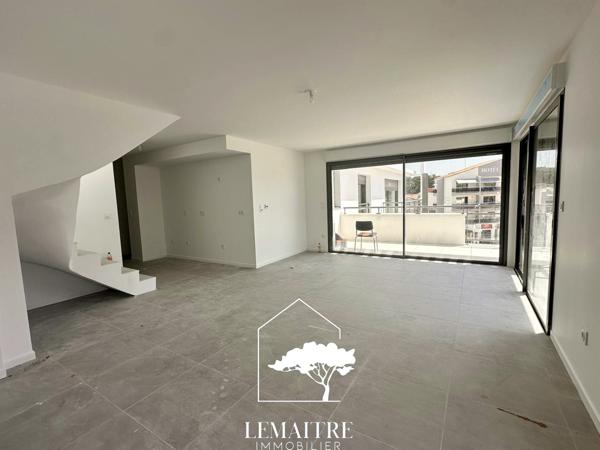 Appartement neuf toit terrasse sur la Palmyre