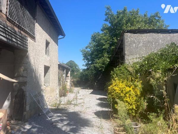 MAISON EN PIERRE AVEC CORPS DE FERME