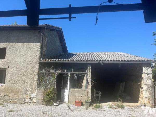 MAISON EN PIERRE AVEC CORPS DE FERME