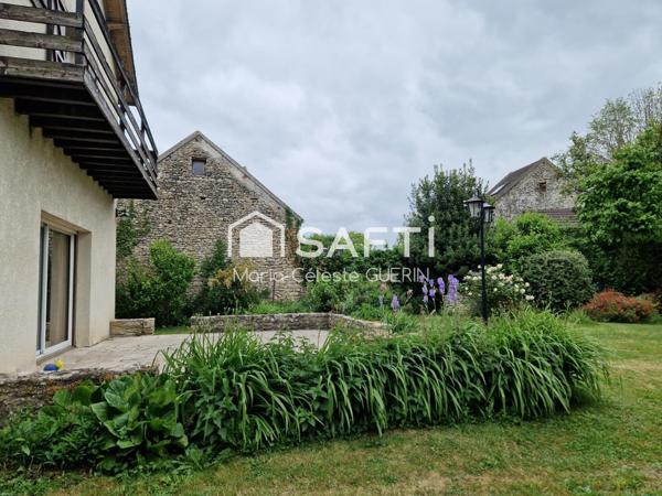 Authenticité et potentiel, une maison à réinventer dans un cadre idéal !