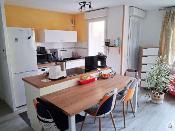 Appartement 2 chambres au calme commerces a pied.