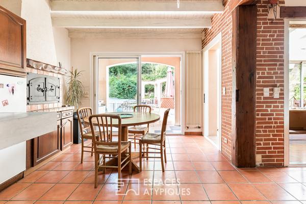 Maison familiale accolée à un bois classé