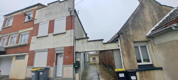 Lot de 2 maisons dont une louée et une libre d'occupation