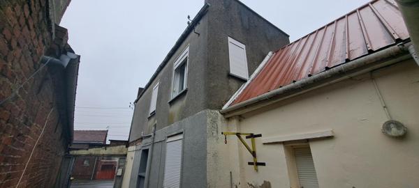 Lot de 2 maisons dont une louée et une libre d'occupation