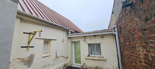 Lot de 2 maisons dont une louée et une libre d'occupation