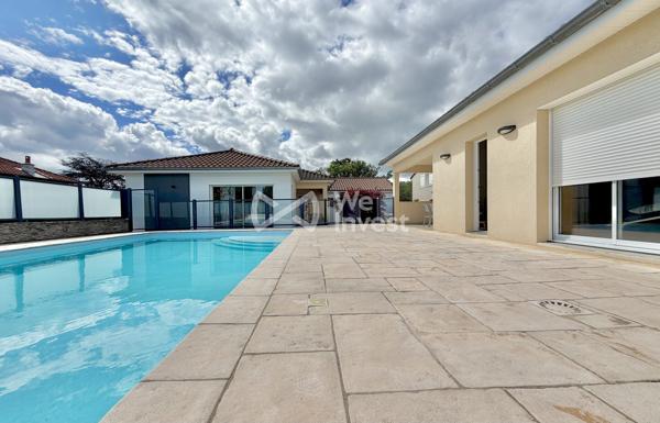 Villa de type 8, sous-sol complet, piscine, pool house, jardin clos et arboré.