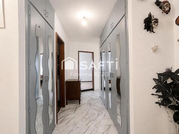 Appartement T3 de 90 m² vendu loué – Balcon – Parking couvert – Cave – Ascenseur