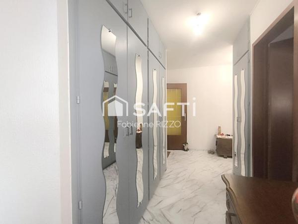 Appartement T3 de 90 m² vendu loué – Balcon – Parking couvert – Cave – Ascenseur