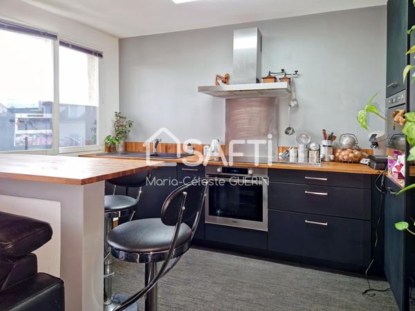 T2 lumineux avec balcon, cave et box au cœur de Limay