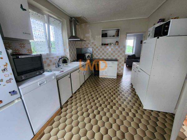 Maison avec terrain au calme