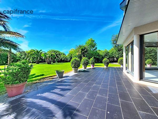 Maison d’architecte – jardin paysager et environnement privilégié à Milizac (29)