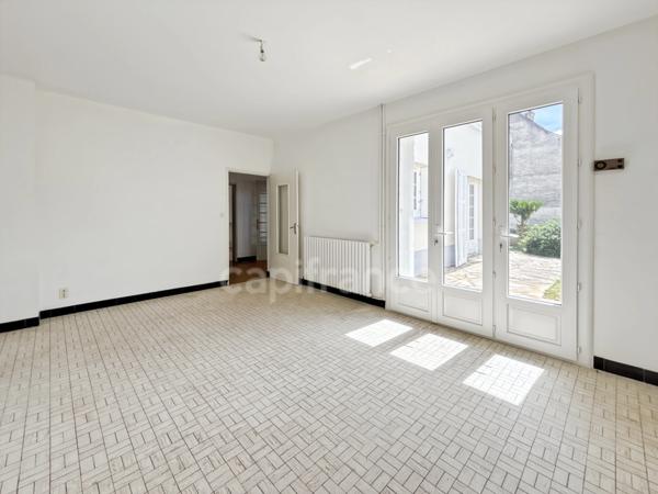 IDEAL INVESTISSEUR Immeuble avec local commercial à vendre SAVIGNE L'EVEQUE (72)
