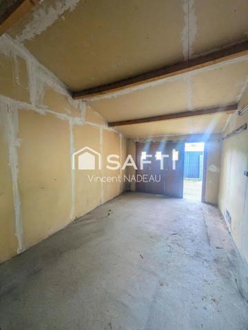 Garage (35m²) sur terrain d'environ 400m²