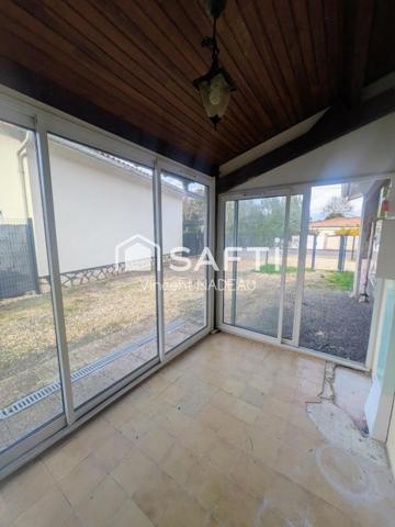 Garage (35m²) sur terrain d'environ 400m²