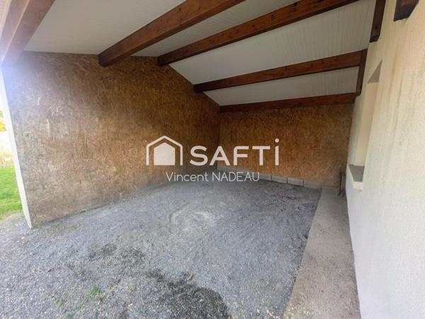 Garage (35m²) sur terrain d'environ 400m²