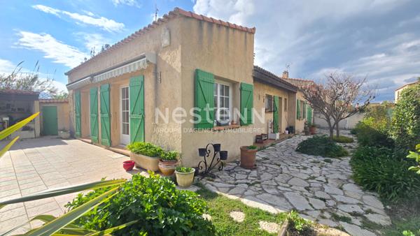 Marignane, Maison 6 pièces d'environ 133 m² sur une parcelle de 603 m² avec piscine.