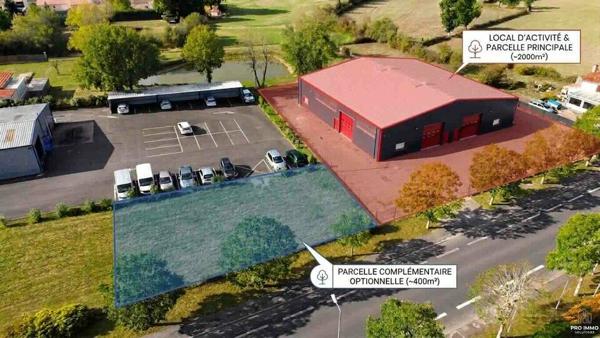 LOCAL D’ACTIVITE AVEC PARKINGS DE 702m2 sur 2000m2 DE TERRAIN AVEC POSSIBILITE DE FONCIER COMPLEMENTAIRE