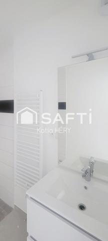 APPARTEMENT AVEC TERRASSE COUVERTE, JARDIN PRIVATIF ET 2 PARKINGS