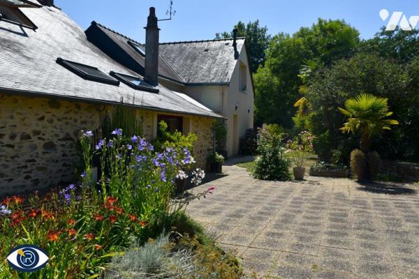 Maison à vendre située en bordure de rivière à Montigné-le-Brillant