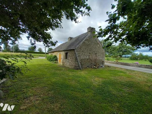 LONGERE DIVISEE EN TROIS LOGEMENTS