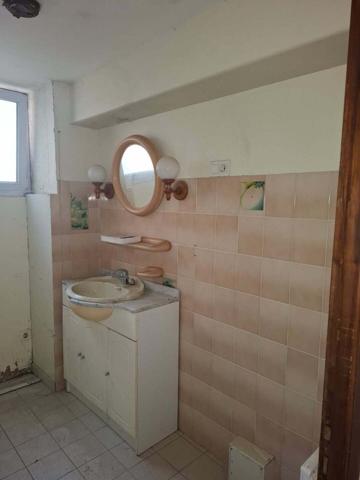 Immeuble de trois appartements de 192 m2 à Mauzé / Mignon