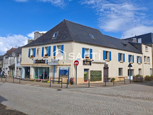 Immeuble mixte avec local commercial et ses deux duplex