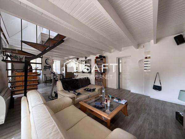 Immeuble mixte avec local commercial et ses deux duplex