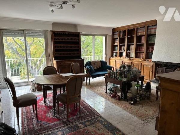 Appartement de 4 pièces de 95.58 m² (loi carrez) avec 1 cave, 2 garages en sous-sol et un emplacemen