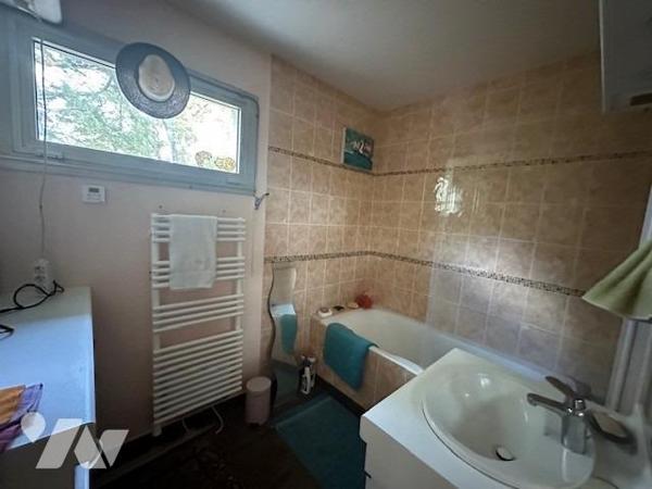 Appartement de 4 pièces de 95.58 m² (loi carrez) avec 1 cave, 2 garages en sous-sol et un emplacemen