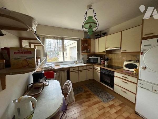 Appartement de 4 pièces de 95.58 m² (loi carrez) avec 1 cave, 2 garages en sous-sol et un emplacemen