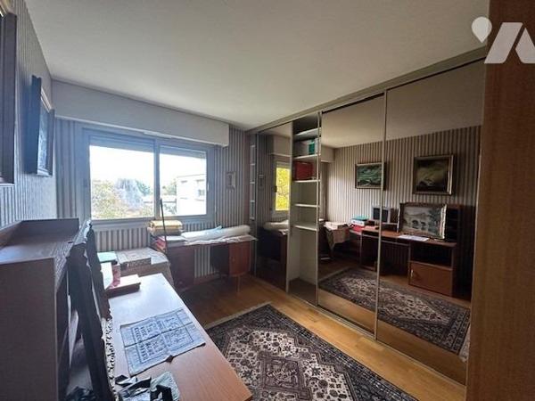 Appartement de 4 pièces de 95.58 m² (loi carrez) avec 1 cave, 2 garages en sous-sol et un emplacemen