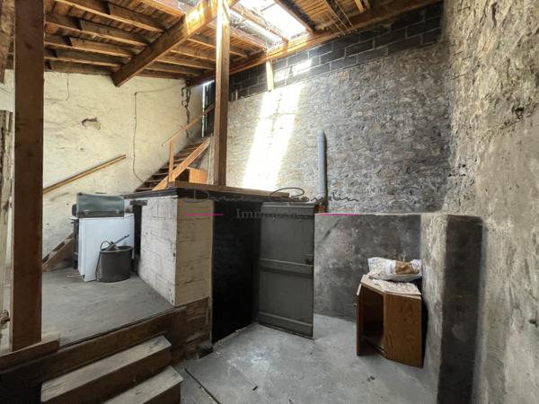 Immeuble avec local commercial et appartement