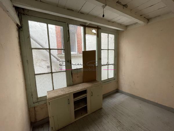 Immeuble avec local commercial et appartement