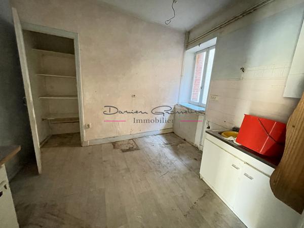 Immeuble avec local commercial et appartement
