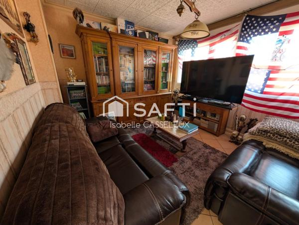 Saint-Quentin - Remicourt : Un immeuble au cachet unique, avec un vaste local commercial en vitrine sur rue passante, idéal pour donner vie à vos projets les plus ambitieux.