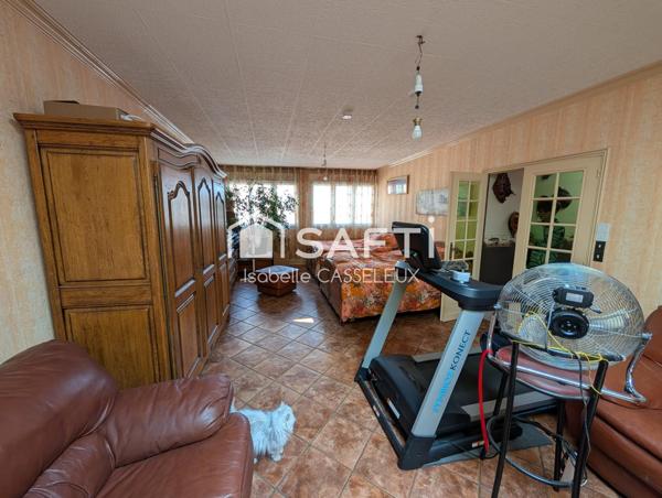 Saint-Quentin - Remicourt : Un immeuble au cachet unique, avec un vaste local commercial en vitrine sur rue passante, idéal pour donner vie à vos projets les plus ambitieux.