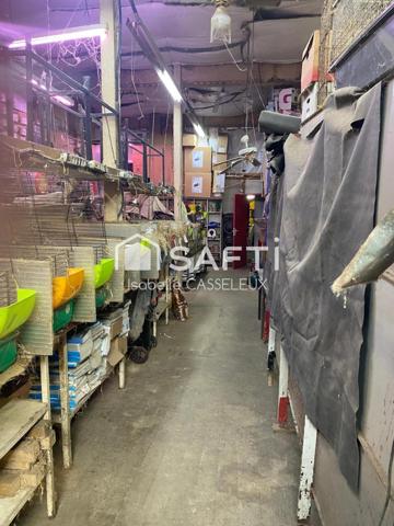 Saint-Quentin - Remicourt : Un immeuble au cachet unique, avec un vaste local commercial en vitrine sur rue passante, idéal pour donner vie à vos projets les plus ambitieux.