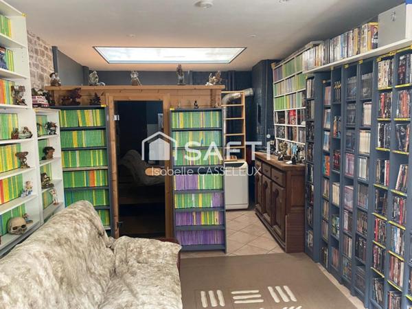 Saint-Quentin - Remicourt : Un immeuble au cachet unique, avec un vaste local commercial en vitrine sur rue passante, idéal pour donner vie à vos projets les plus ambitieux.