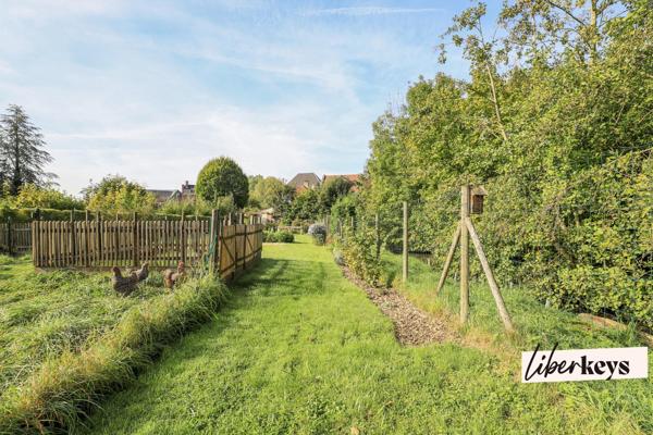 Maison 4 chambres, 180 m² avec local commercial loué, cour, jardin et potentiel d’aménagement