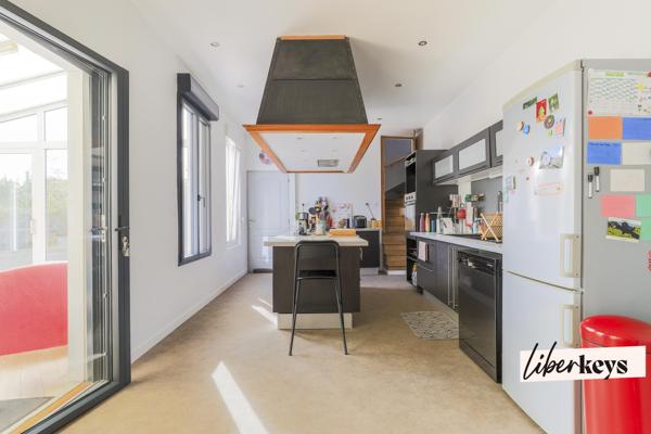 Maison 4 chambres, 180 m² avec local commercial loué, cour, jardin et potentiel d’aménagement