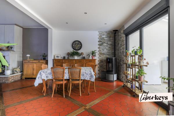 Maison 4 chambres, 180 m² avec local commercial loué, cour, jardin et potentiel d’aménagement