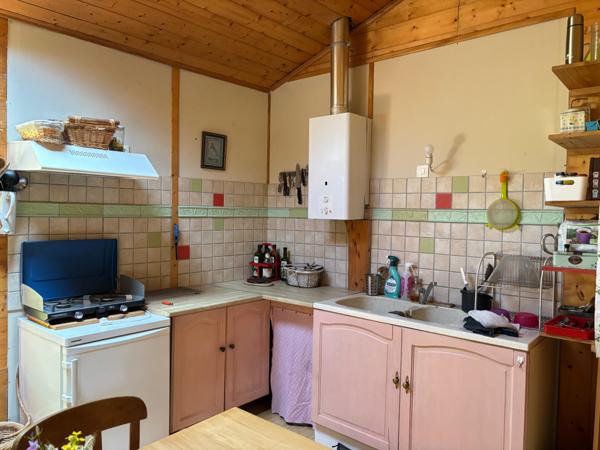 Maison en pleine nature, sur terrain boisé