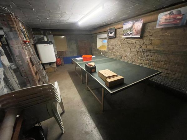 Maison mitoyenne F5 avec terrain, terrasse, parking et 3 garages